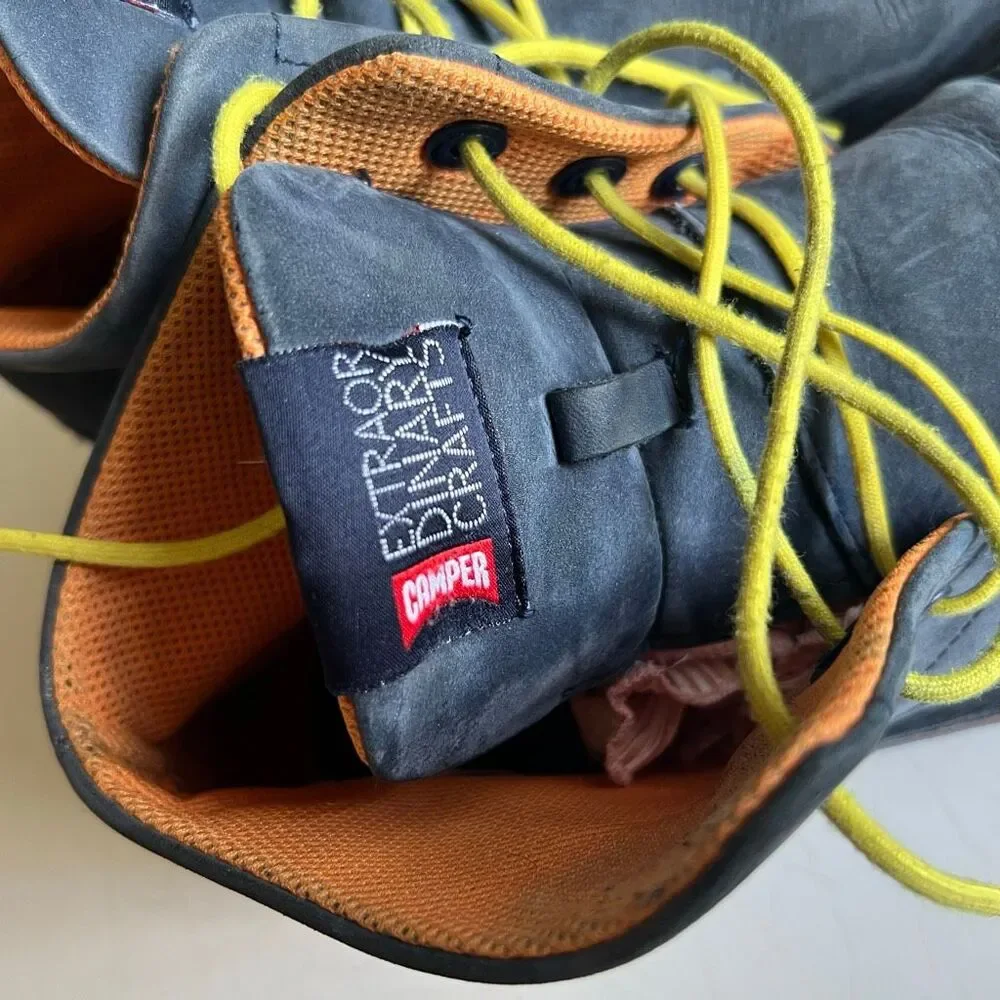 Camper Extraordinary Crafts chukka boots feature dark gray suede uppers and vibr